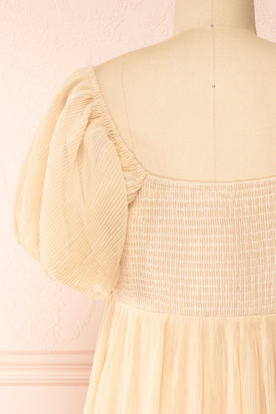 Araminta Beige Pleated Maxi Babydoll Dress | Boutique 1861 back close-up