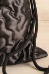 Arhi-Anne Puffy Black Drawstring Tote Bag | La petite garçonne bottom close-up