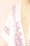 Arwen White Poncho w/ Pastel Print | Boutique 1861 front close-up