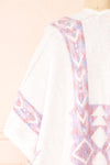 Arwen White Poncho w/ Pastel Print | Boutique 1861 back close-up