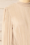 Atyrau Beige Short Pleated Dress w/ Long Sleeves | La petite garçonne side close-up