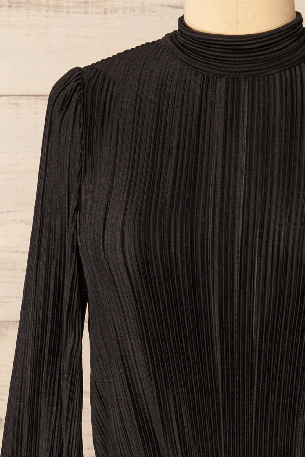 Atyrau Black Short Pleated Dress w/ Long Sleeves | La petite garçonne front close-up