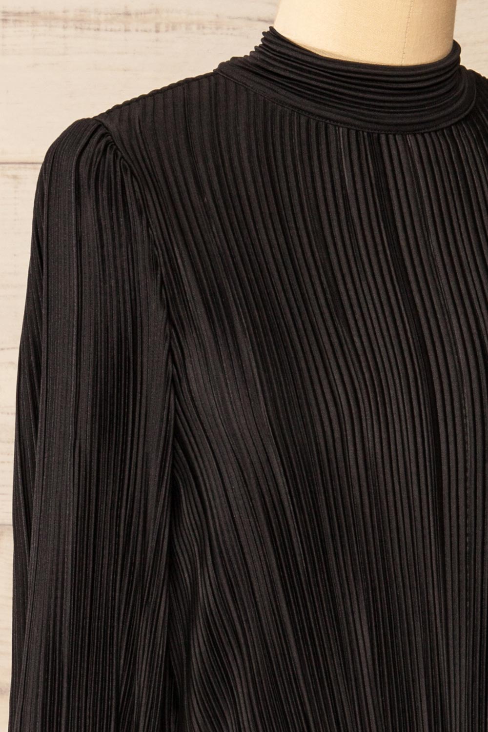 Atyrau Black Short Pleated Dress w/ Long Sleeves | La petite garçonne side close-up
