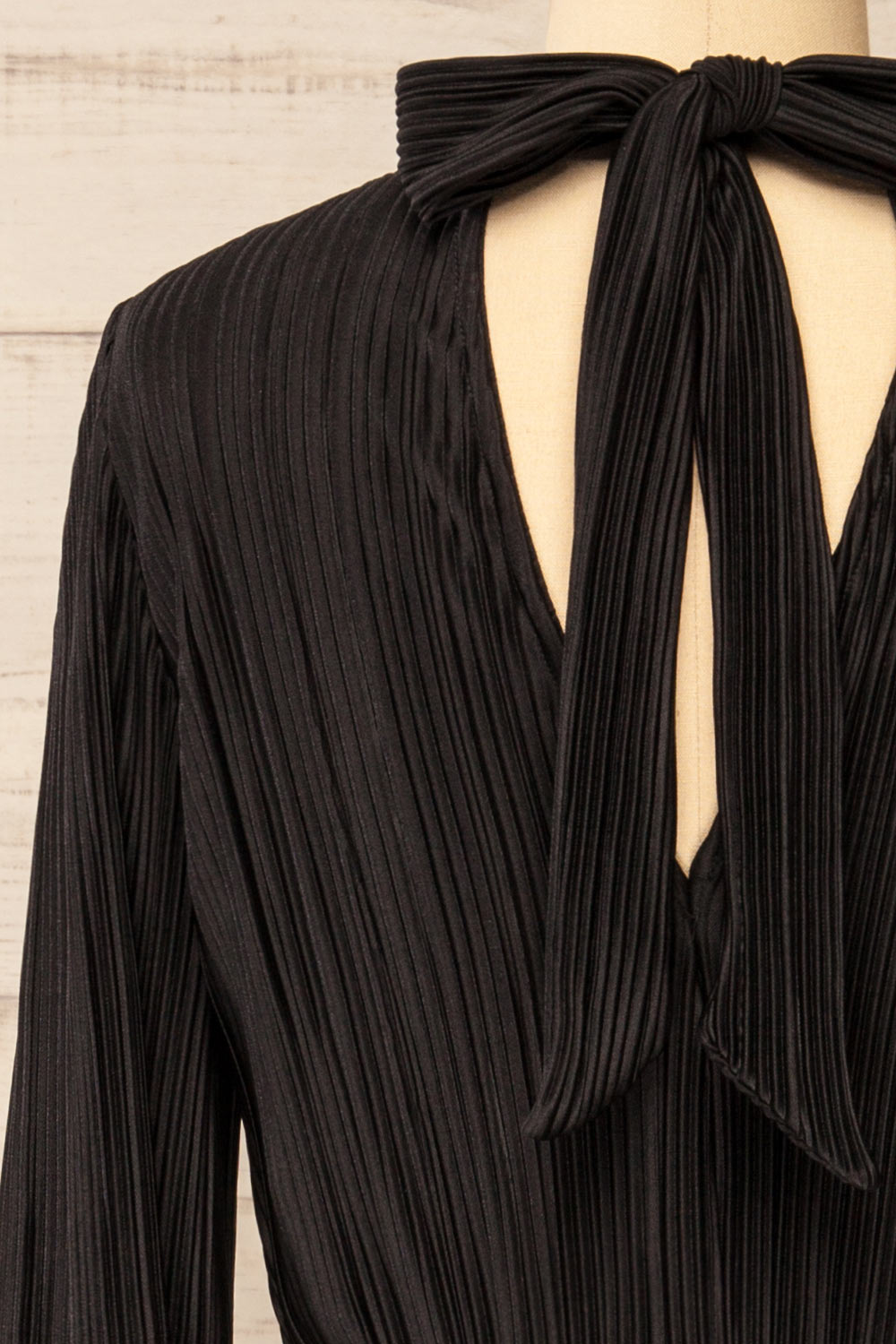 Atyrau Black Short Pleated Dress w/ Long Sleeves | La petite garçonne back close-up