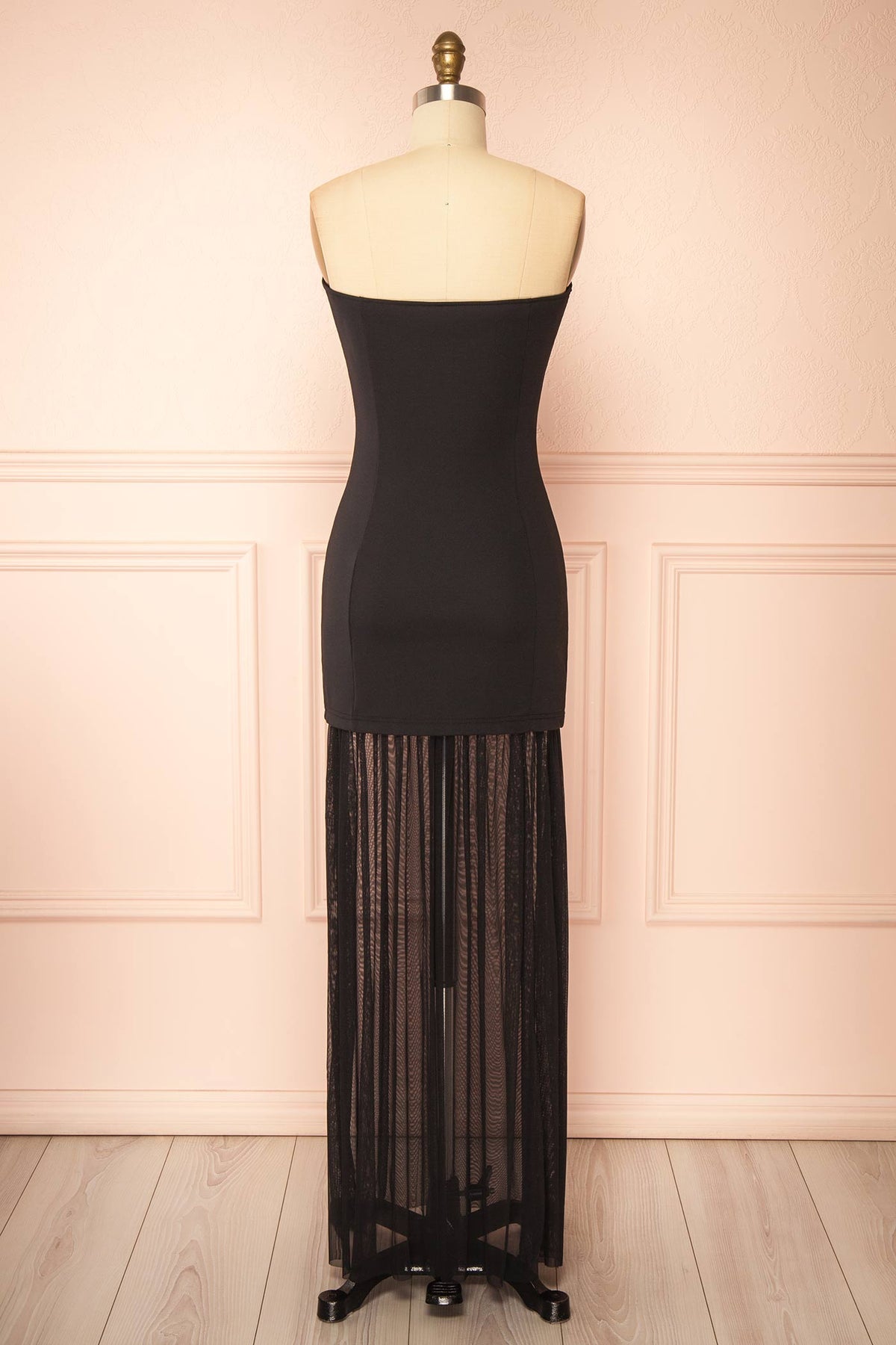 back view of Axelia Black Strapless Maxi Dress with Sheer Mesh Hem at Boutique 1861