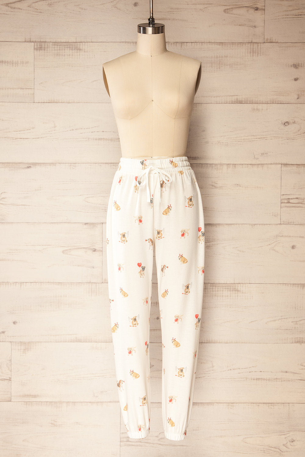 Ballari White Jogger Pants with Dog Print | La petite garçonne front view