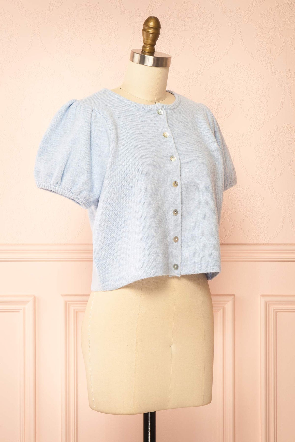 side view of Belza Blue Short Sleeve Puff Sleeve Cropped Knit Cardigan at Boutique 1861