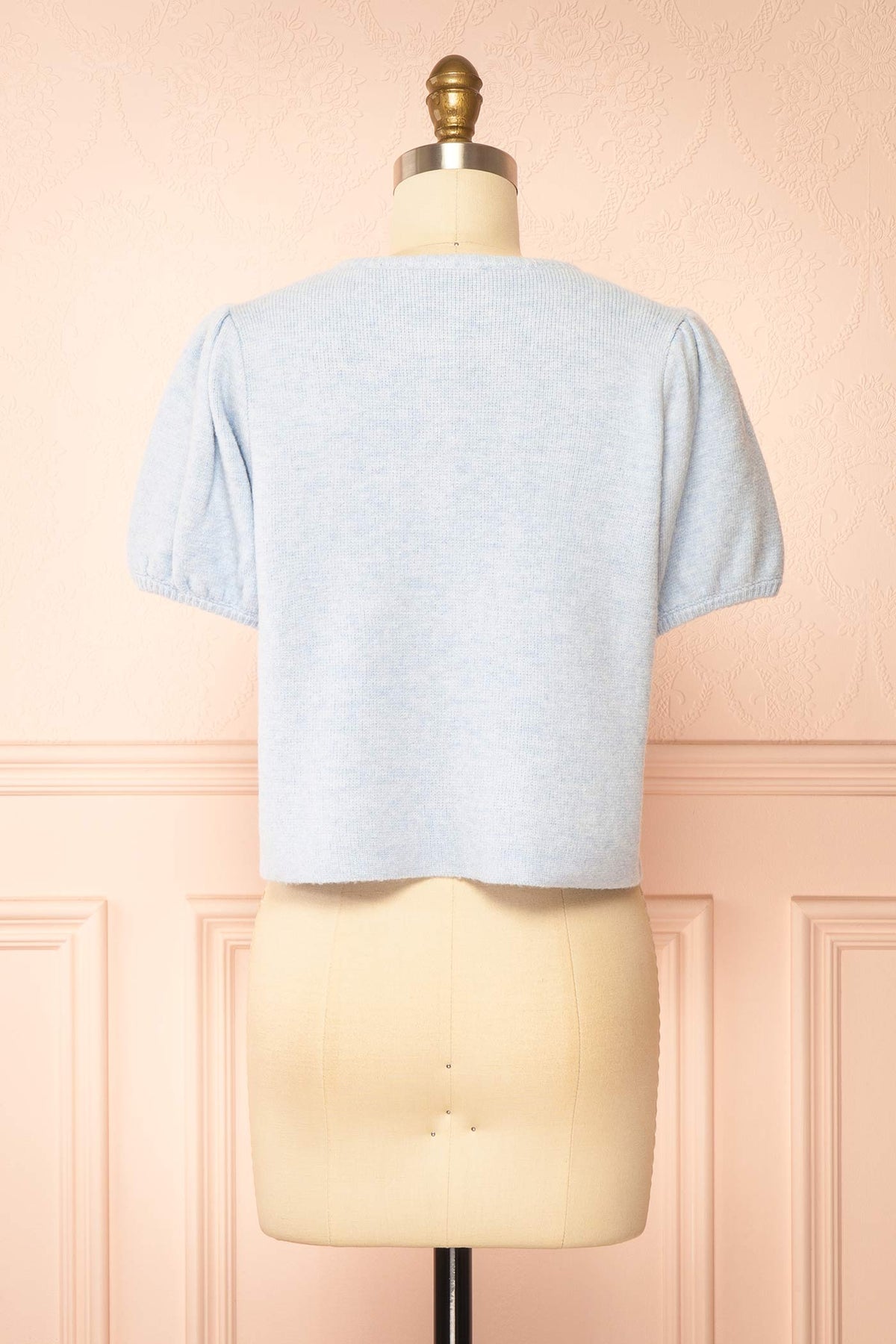 back view of Belza Blue Short Sleeve Puff Sleeve Cropped Knit Cardigan at Boutique 1861