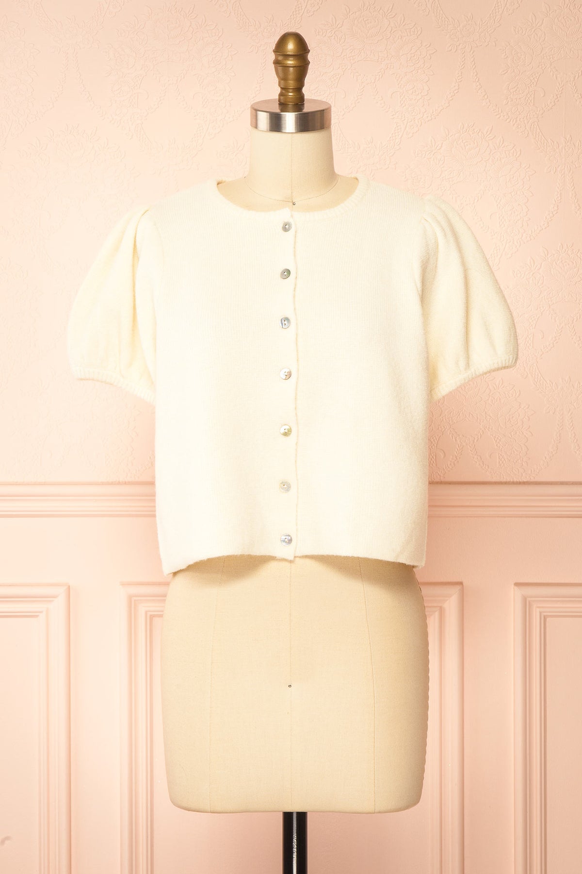 front view of Belza Ivory Short Sleeve Puff Sleeve Cropped Knit Cardigan at Boutique 1861