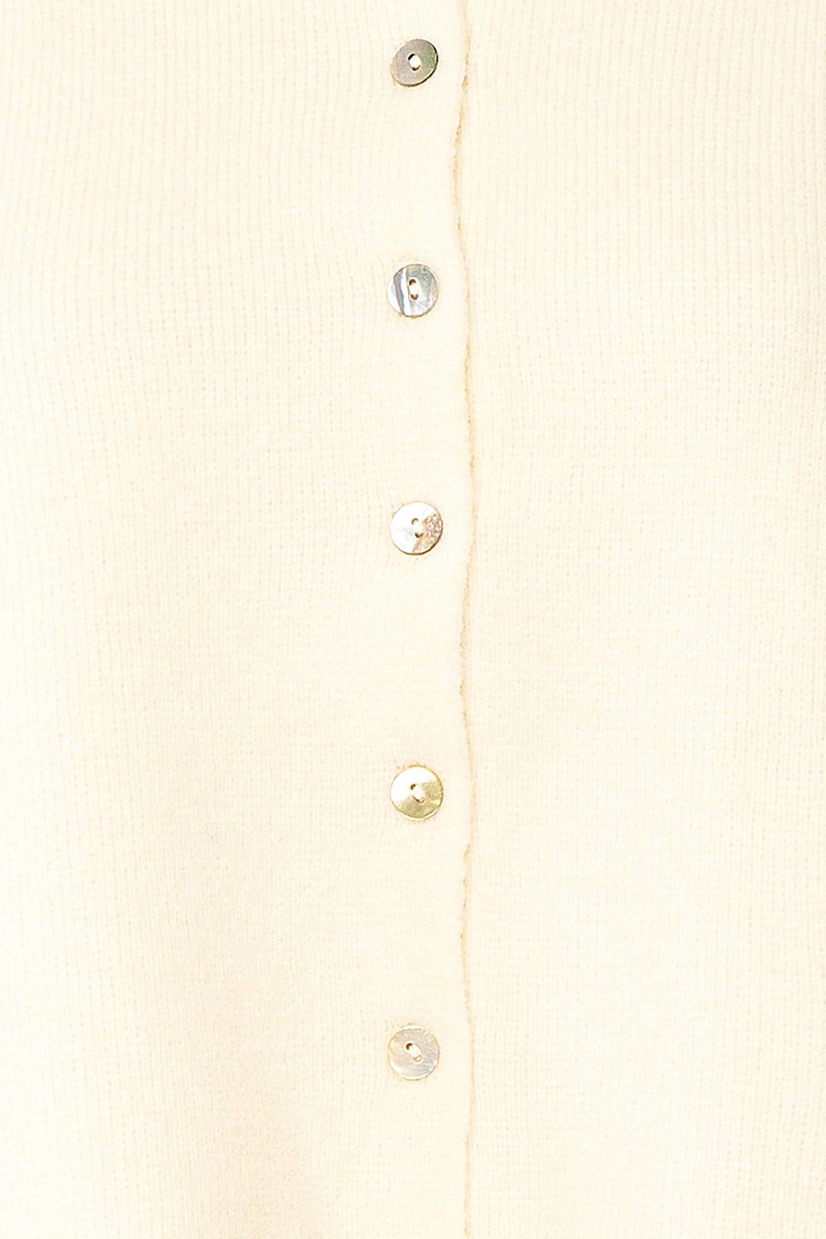 fabric view of Belza Ivory Short Sleeve Puff Sleeve Cropped Knit Cardigan at Boutique 1861