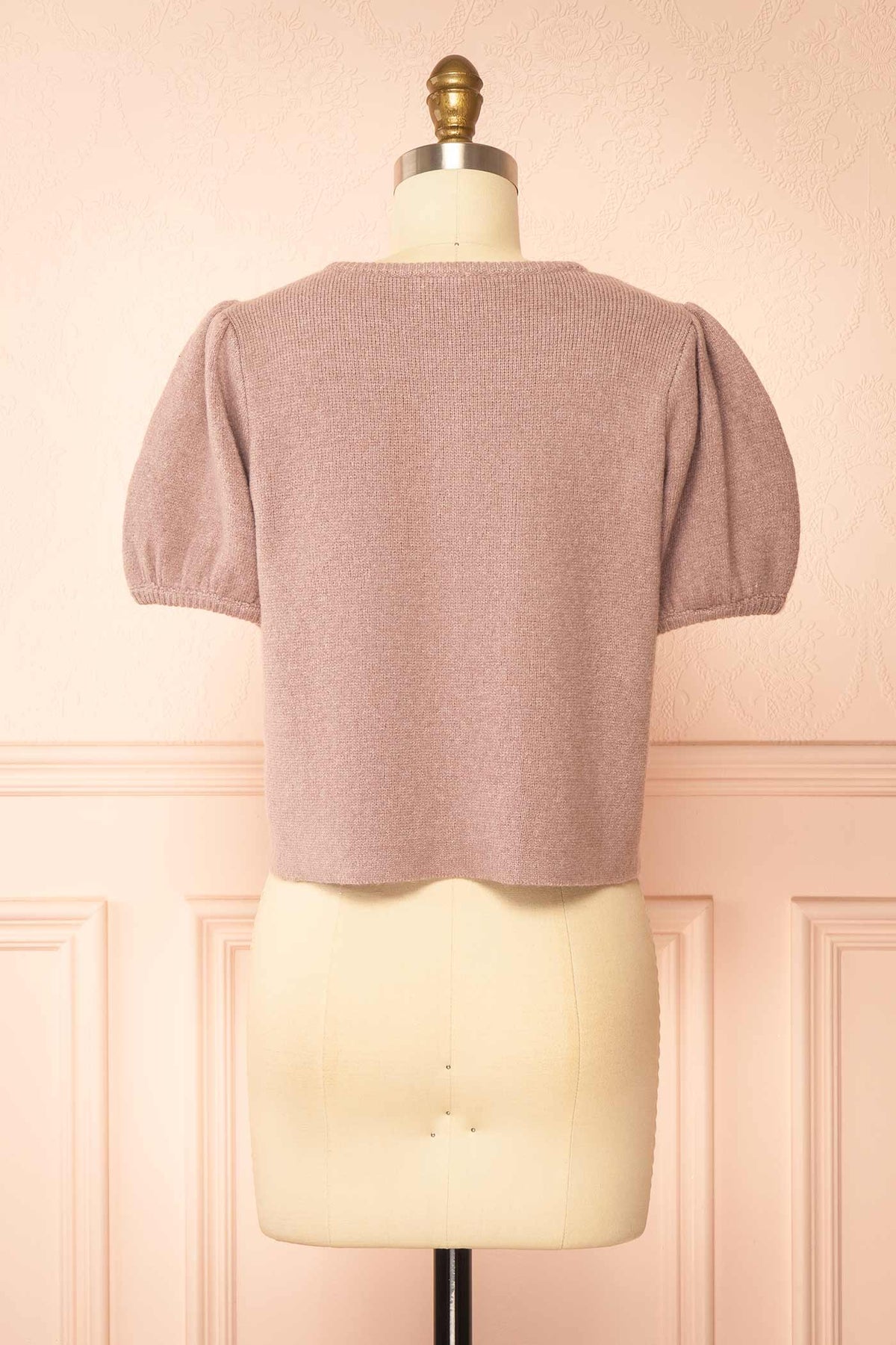back view of Belza Mauve Short Sleeve Puff Sleeve Cropped Knit Cardigan at Boutique 1861