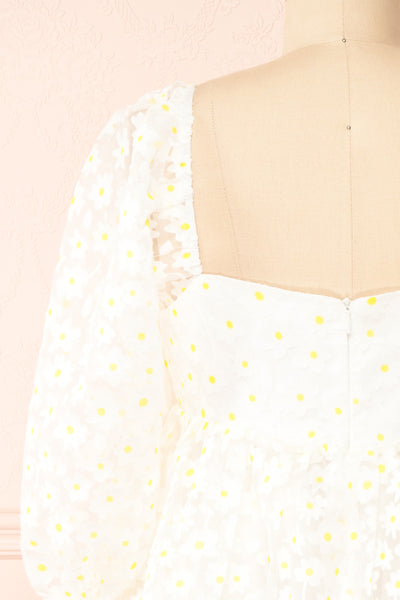 Bina White Babydoll Dress w/ Daisies | Boutique 1861 back close-up