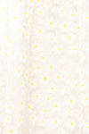 Bina White Babydoll Dress w/ Daisies | Boutique 1861 fabric