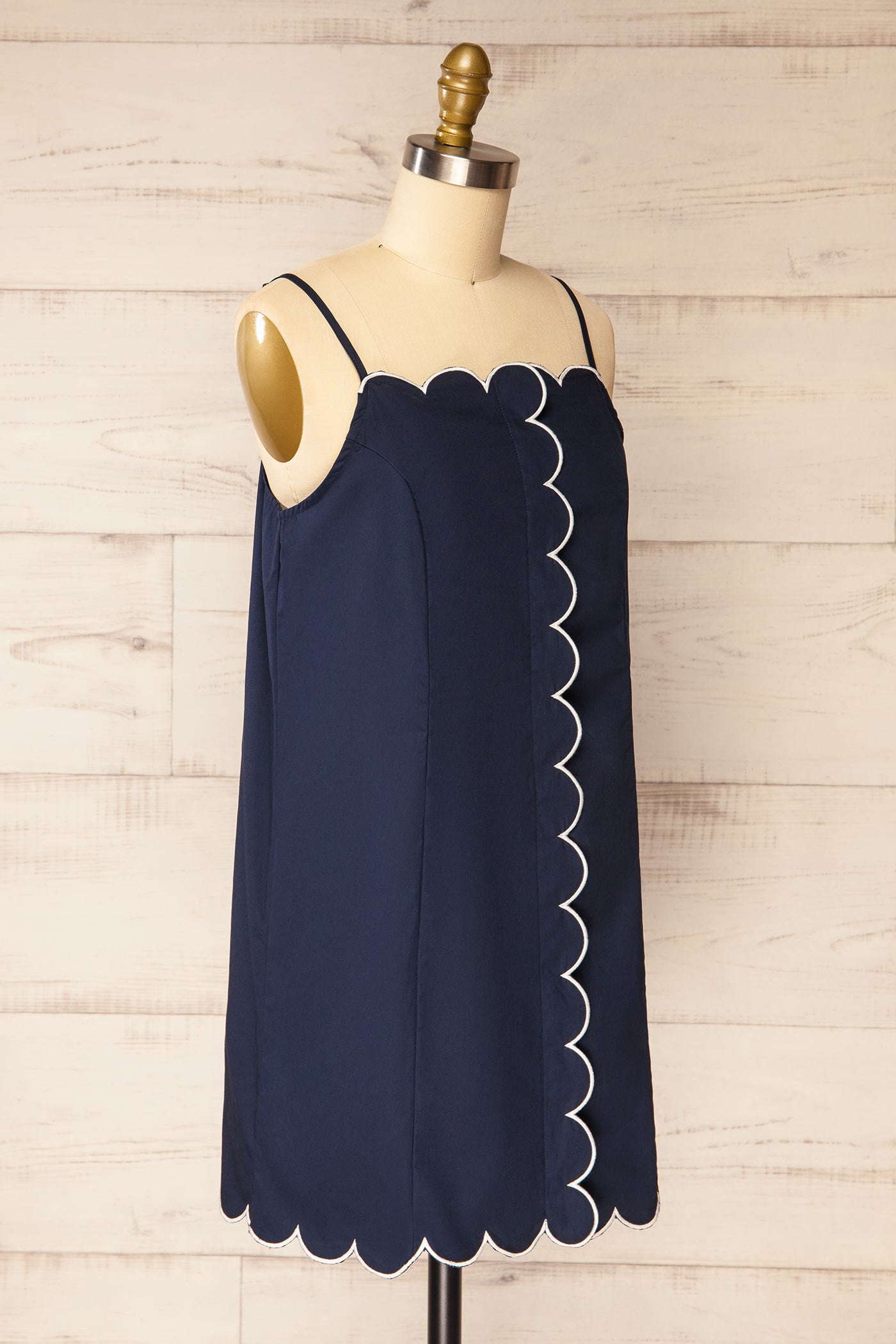 Sideview Bithur Navy Scalloped Trim Short Dress with Contrast Piping at la petite garçonne