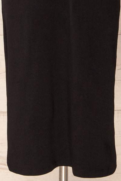 Bogota Black Short Sleeve Midi Dress | La petite garçonne bottom close-up