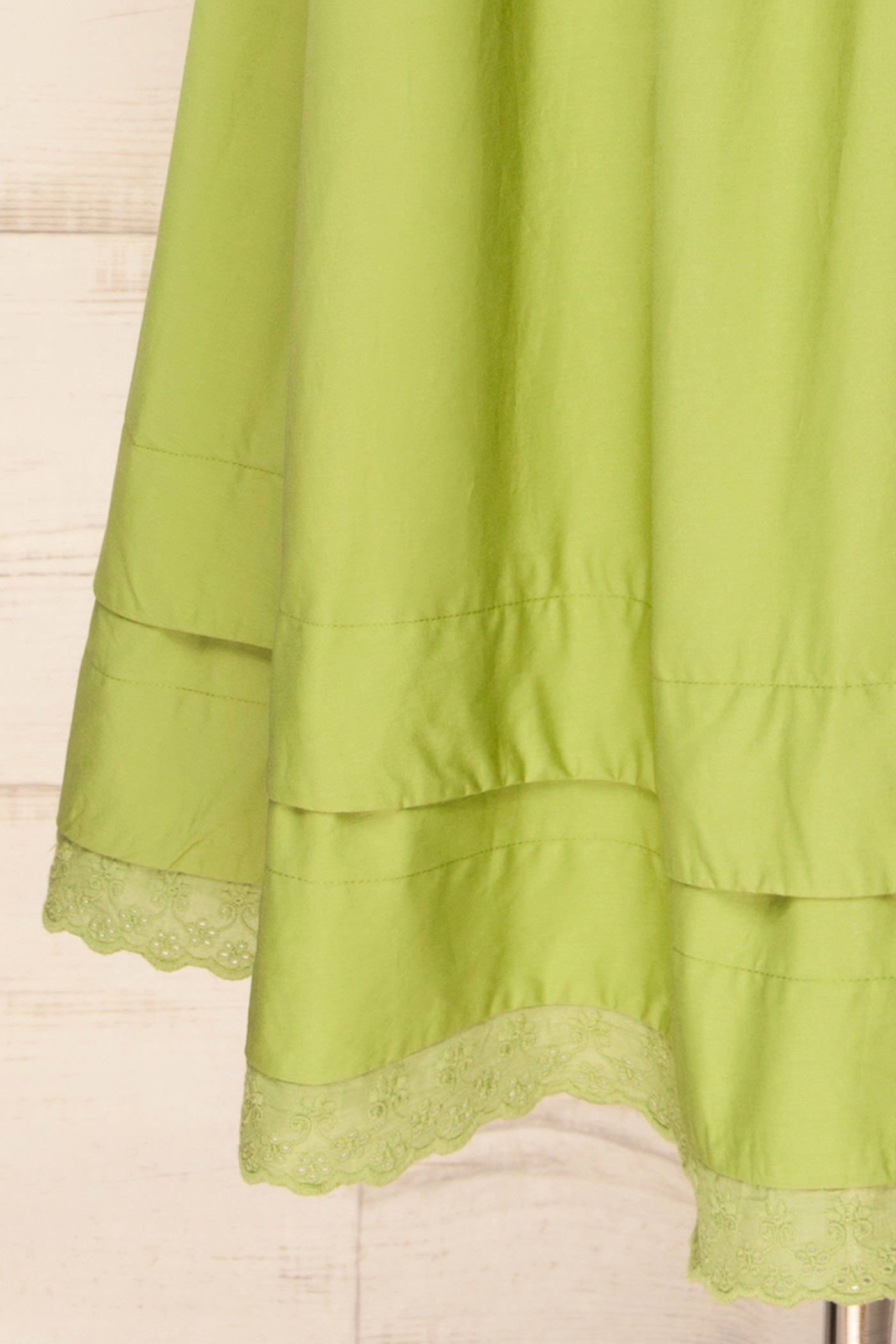 Close-up Bolsena Green Knitted Top Midi Dress with Eyelet Trim at la petite garçonne