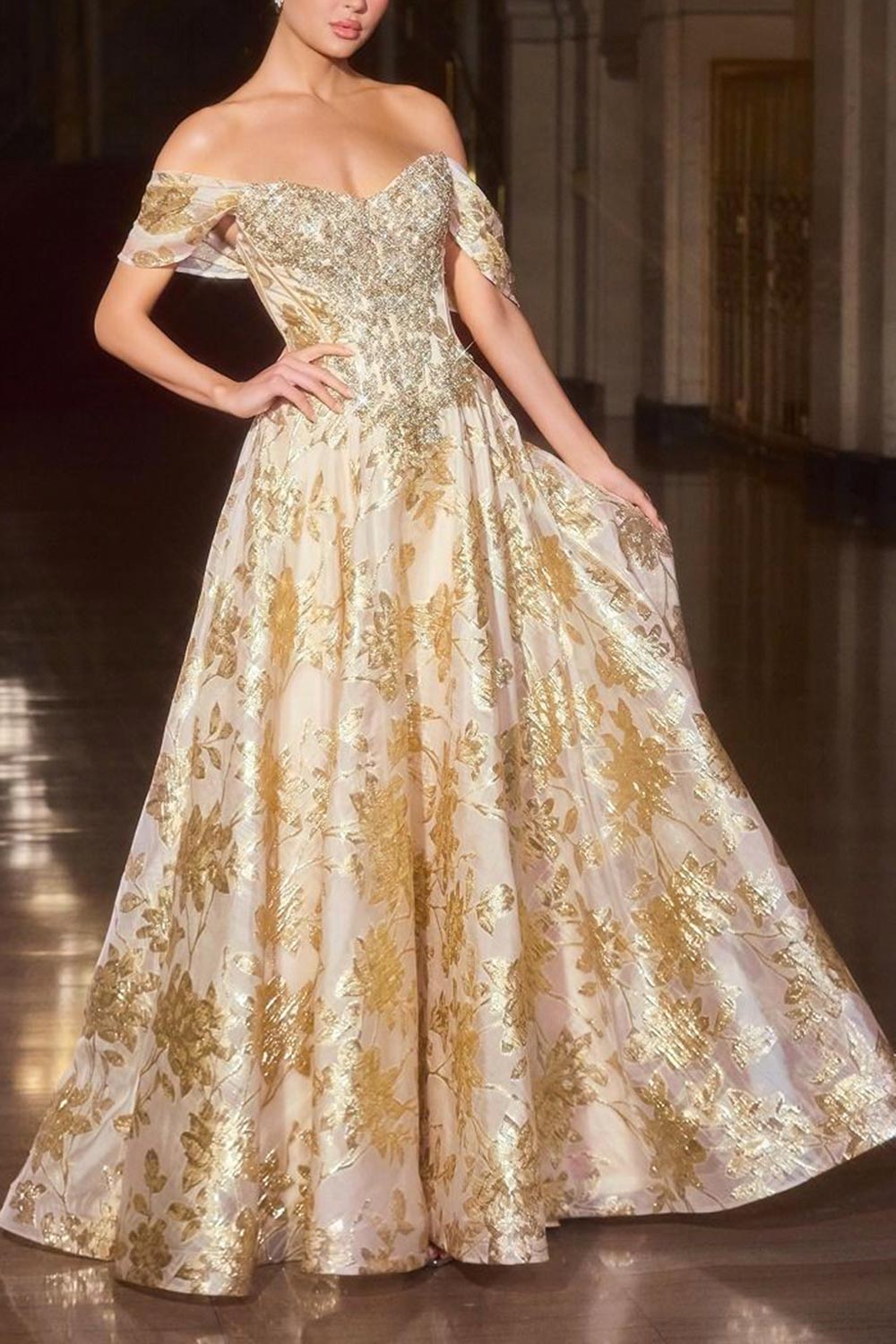 front view of a woman wearing Bridgitte Gold Off-Shoulder A-Line Maxi Corset Dress from Boutique 1861