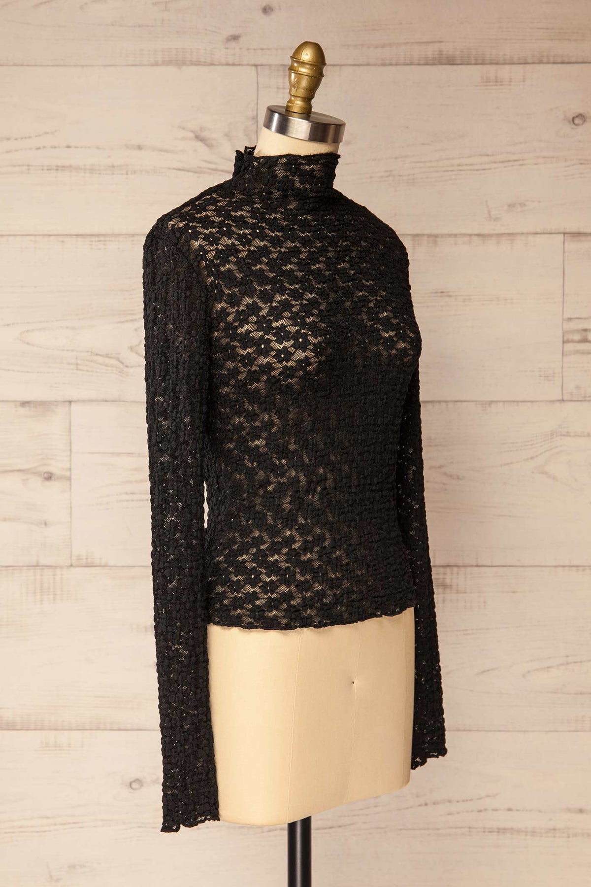 side view of Burgeo Sheer Black Lace Mock Neck Top with Thumbhole Cuffs at La petite garçonne