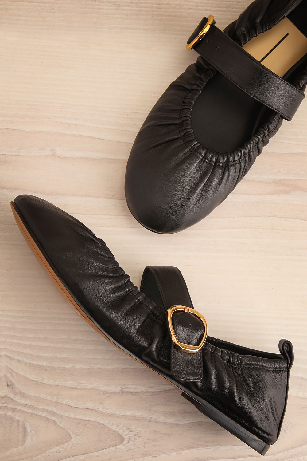 Caelie Black Leather Ballet Flats with Gold Buckle | La petite garçonne flat lay