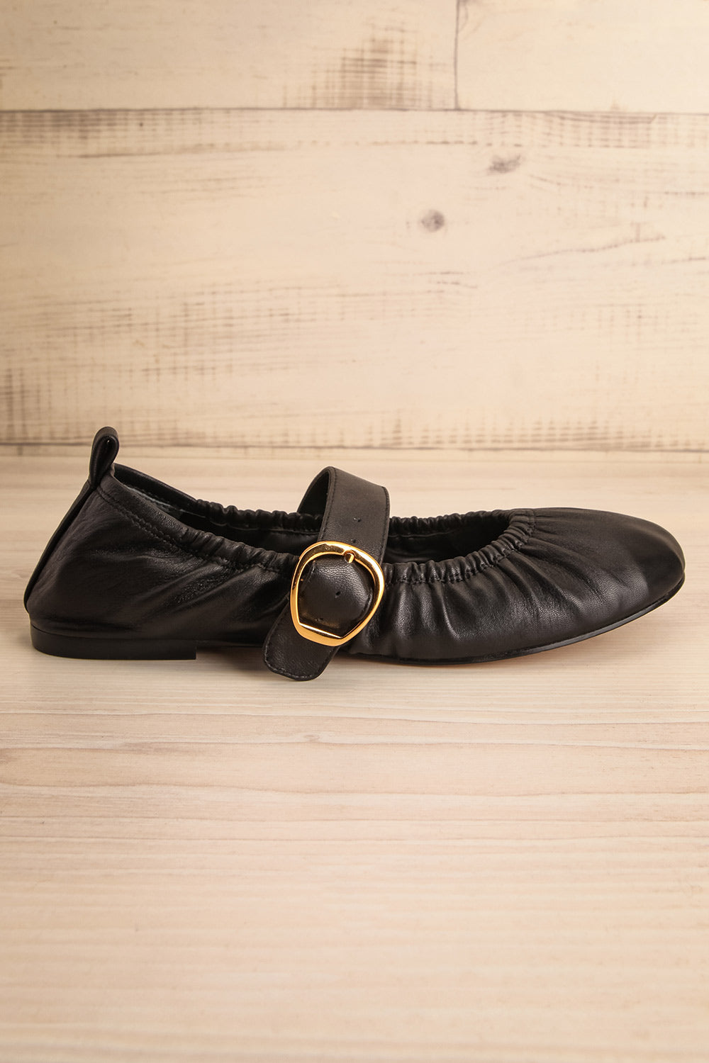 Caelie Black Leather Ballet Flats with Gold Buckle | La petite garçonne front view