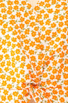Calantra Faux Wrap Blouse w/ Orange Floral Motif | Boutique 1861  fabric