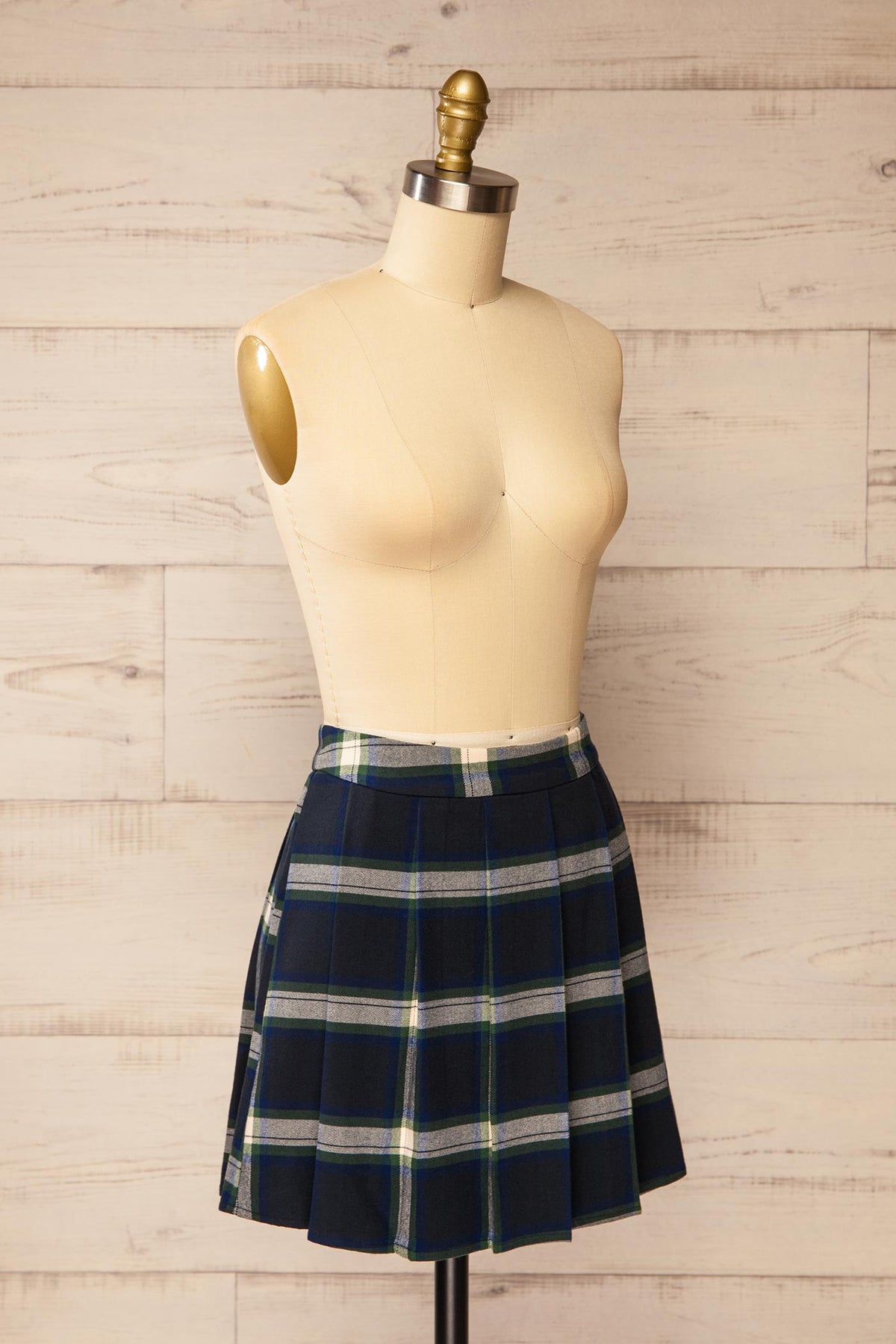 side view of Calenzana Plaid Pleated Mini Skirt at La petite garçonne