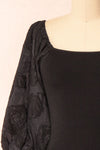 Calixta Black Midi Dress w/ Textured Sleeves | Boutique 1861 front close-up