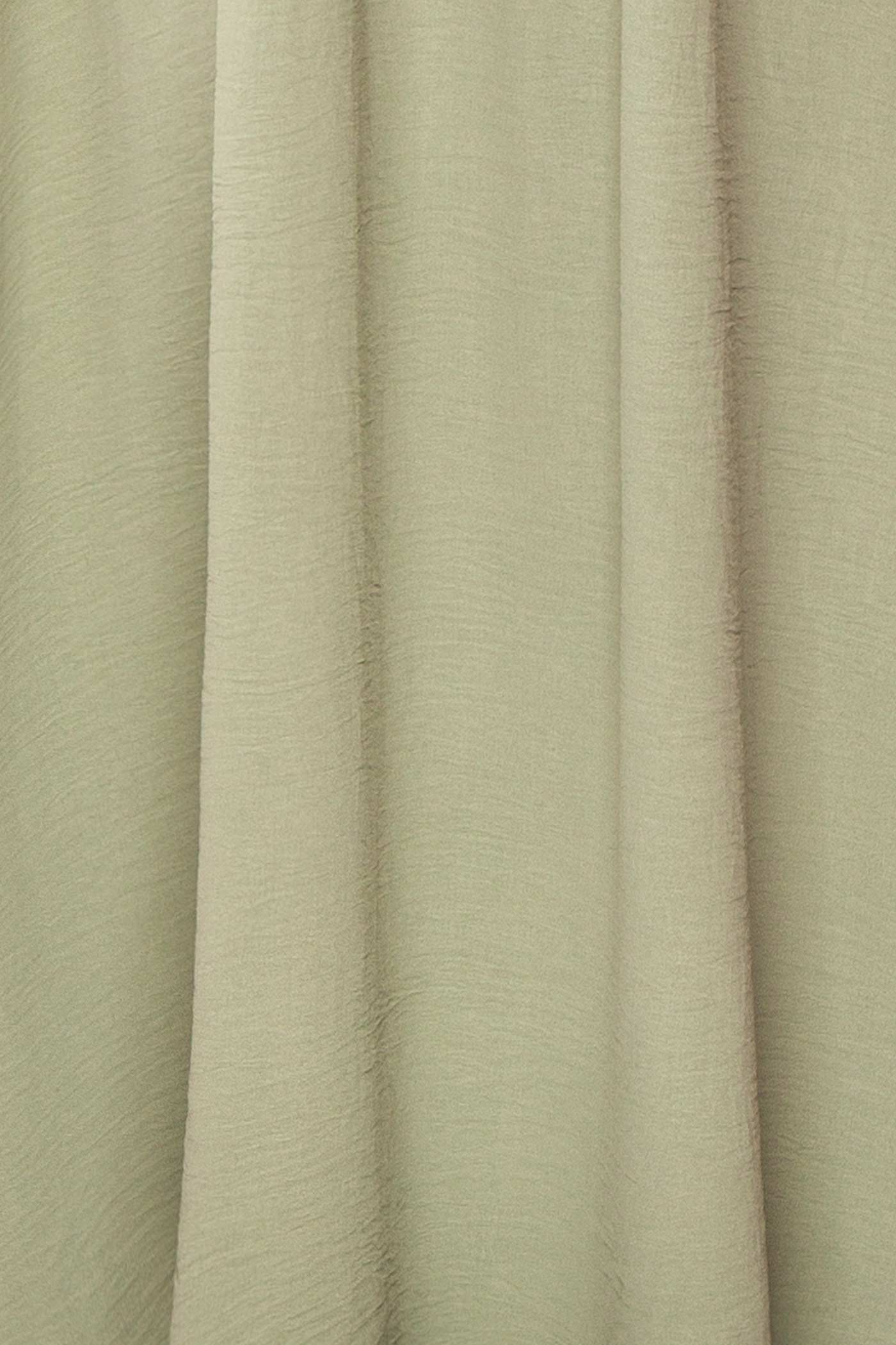 Close-up Cambrie Sage Maxi Dress with V-Neck at la boutique 1861