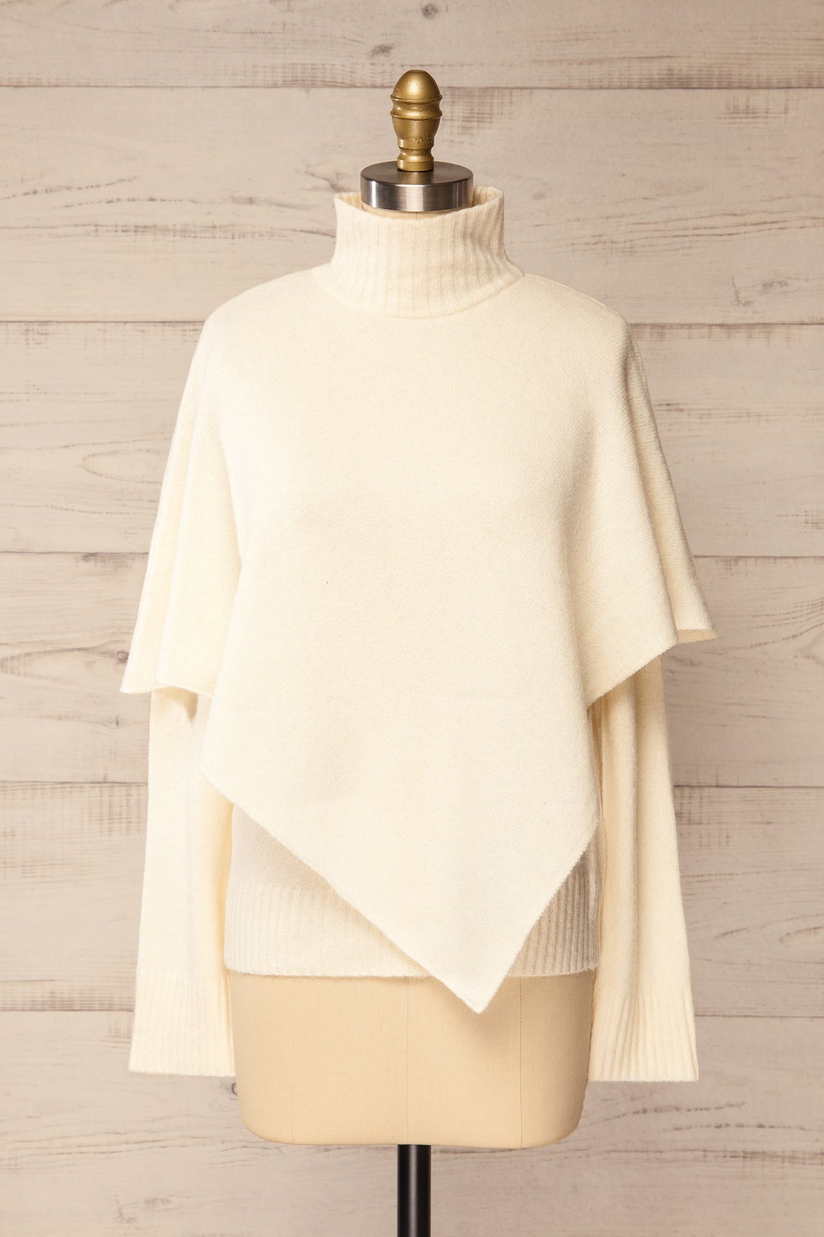 front view of Caplan Ivory Asymmetrical Overlay Knit Sweater at La petite garçonne