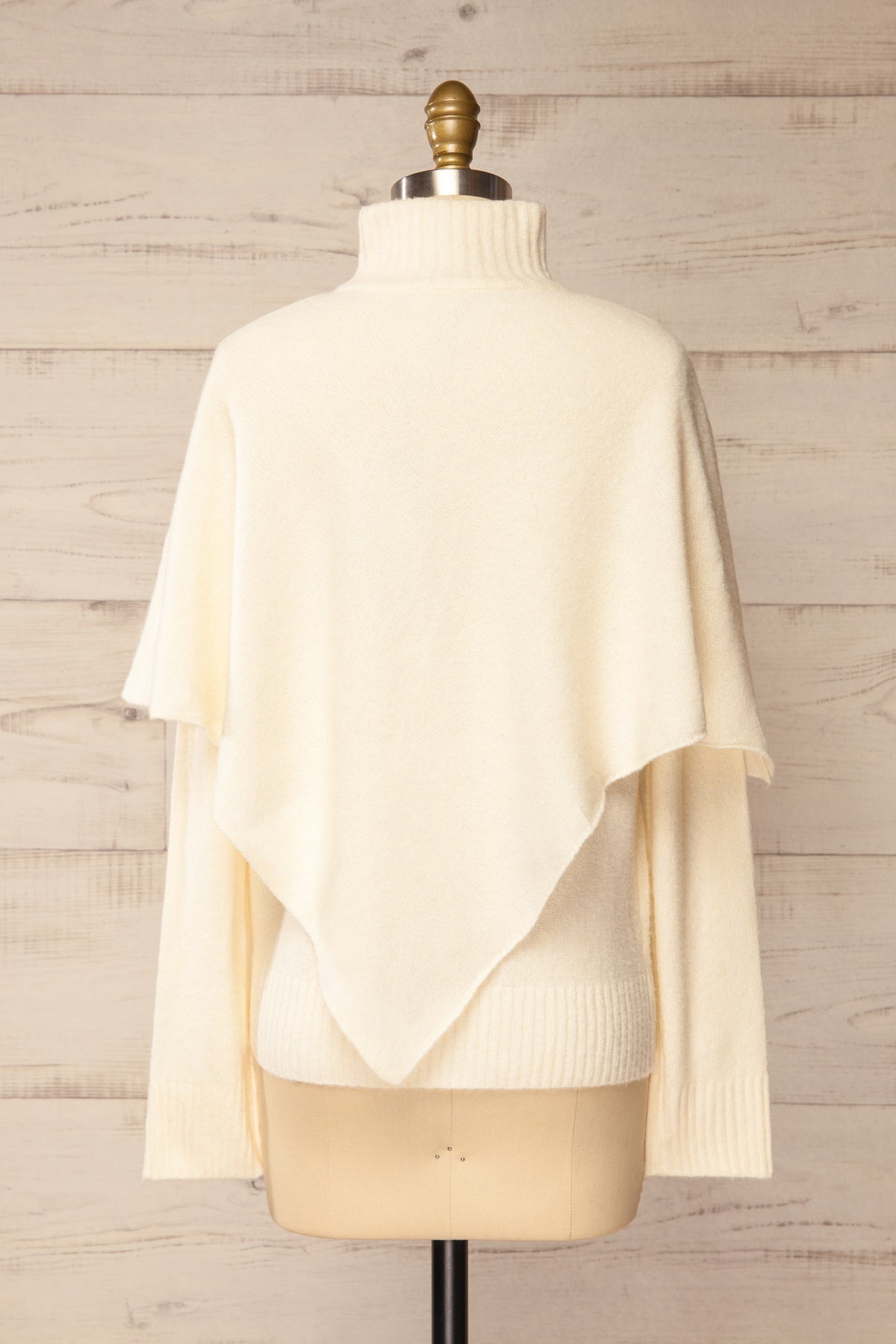back view of Caplan Ivory Asymmetrical Overlay Knit Sweater at La petite garçonne
