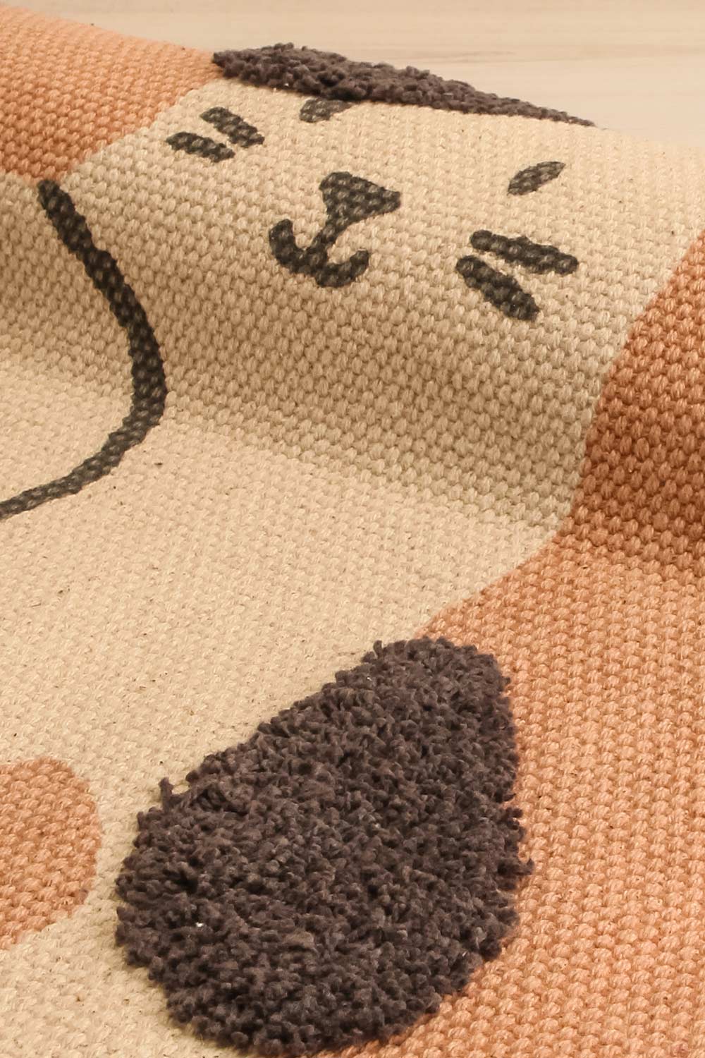 Caresse Textured Rug with Cats | Maison garçonne close-up