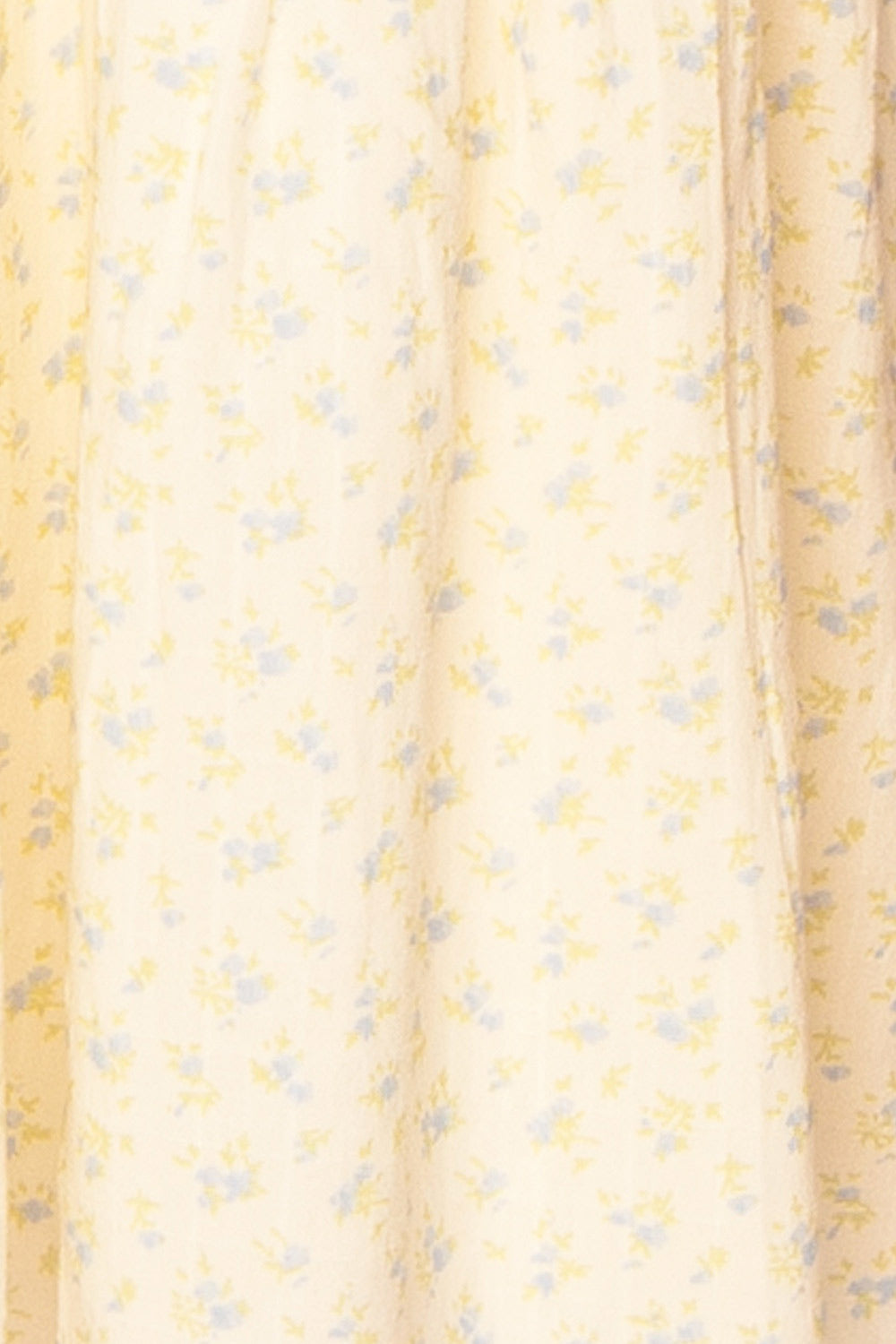 Carolane Maxi Cream Dress w/ Blue Floral Pattern | Boutique 1861 fabric