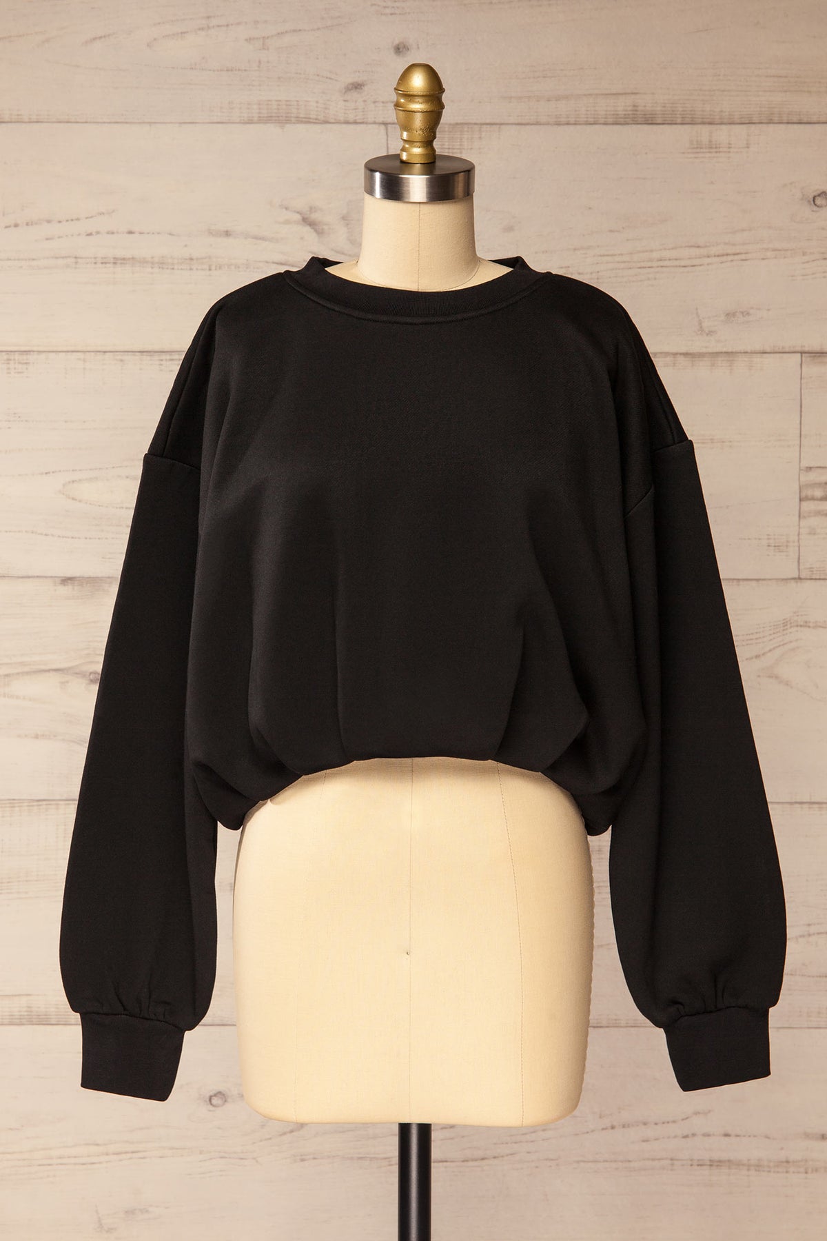 front view of Cobija Black Cropped Sweatshirt with Elastic Hem at La petite garçonne