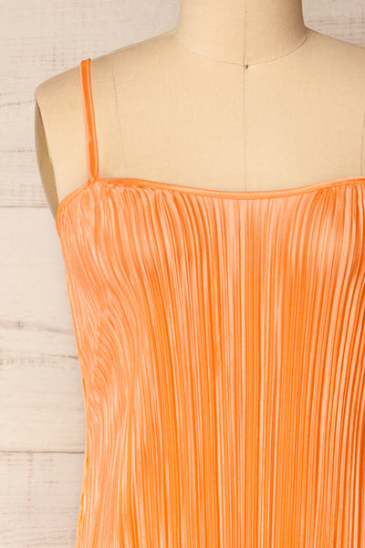 Cordoba Orange Pleated Midi Dress | La petite garçonne front close-up