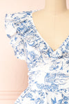Cressida White & Blue Patterned Midi Dress w/ Ruffles | Boutique 1861 front close-up