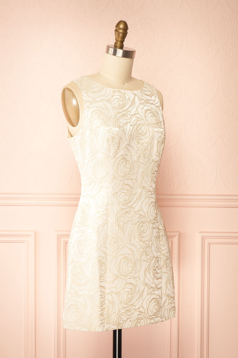 side view of mannequin wearing Daenna Ivory, a Short Floral Embroidered Dress from boutique 1861