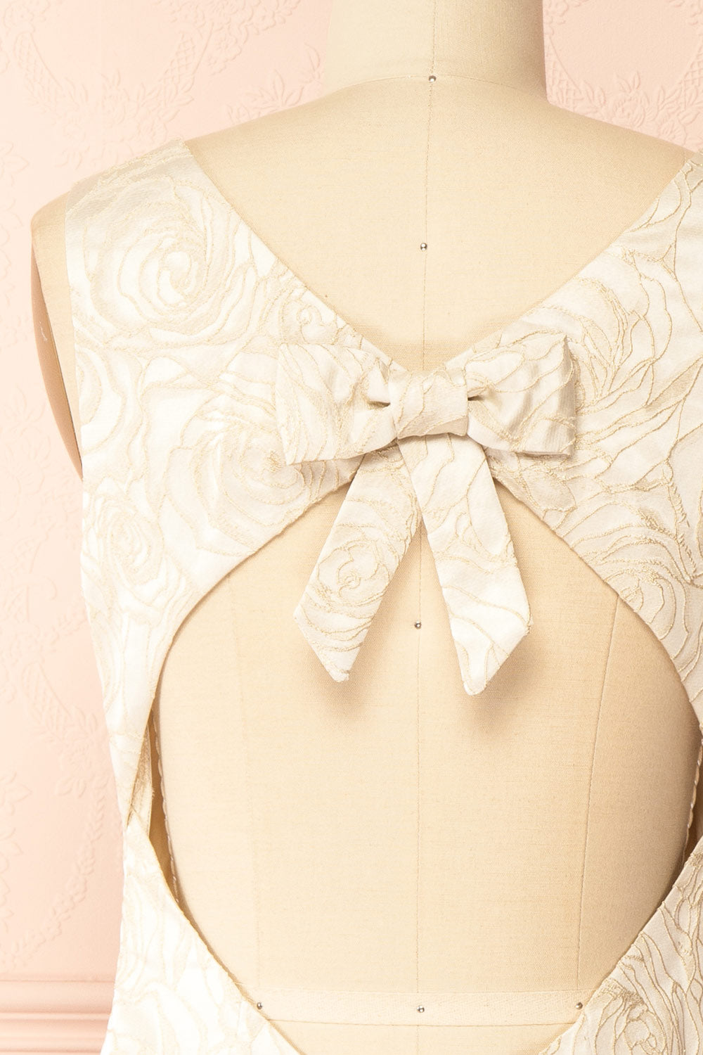  back of mannequin wearing Daenna Ivory, a Short Floral Embroidered Dress from boutique 1861