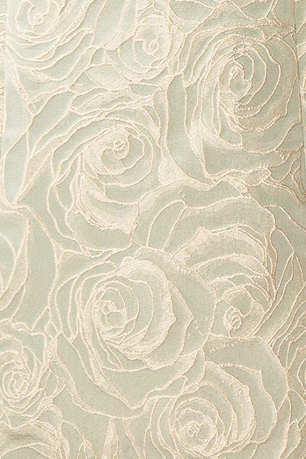 fabric of a mannequin wearing a Daenna Sage Short Floral Embroidered Dress from boutique 1861