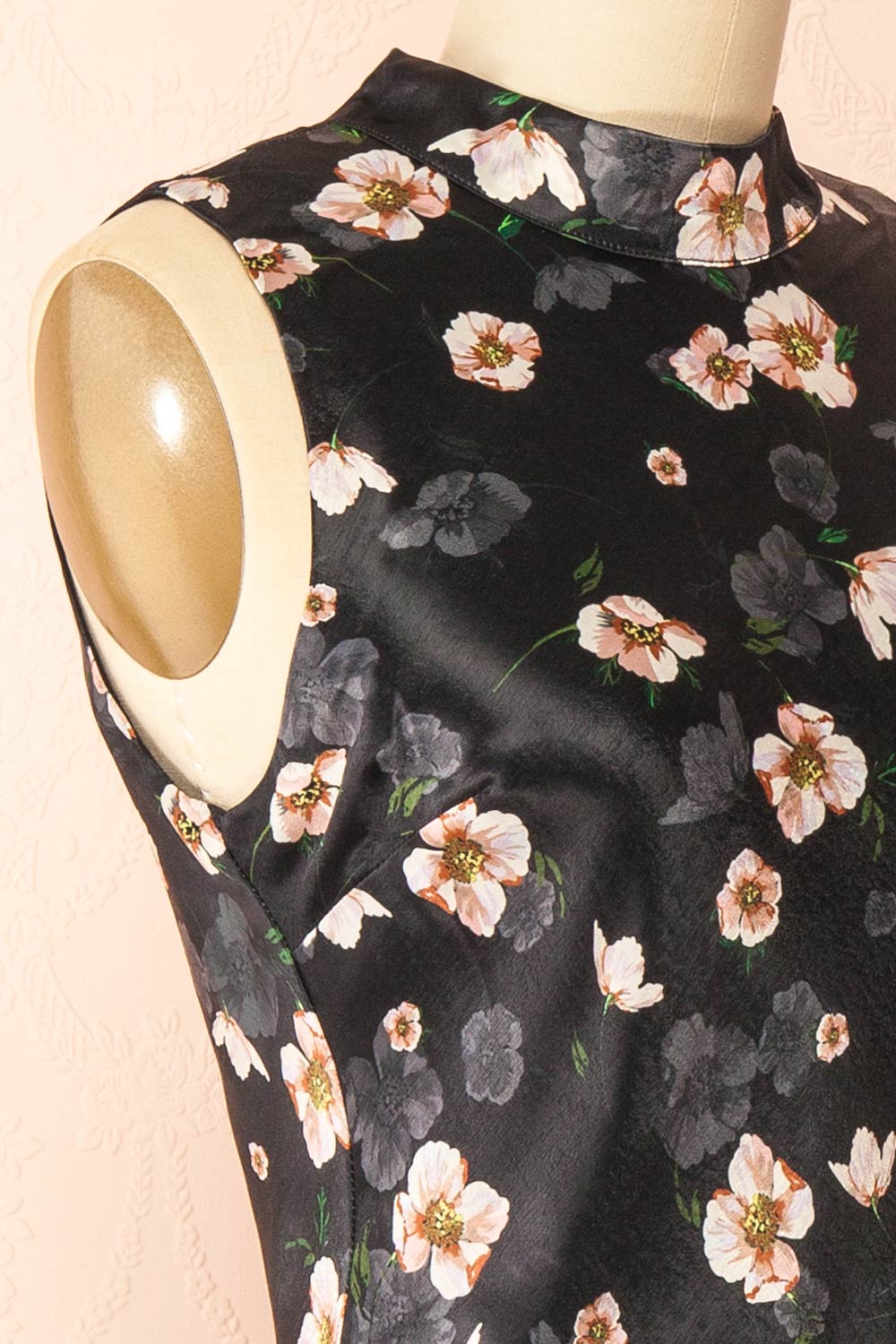 side of sewing mannequin wearing Dalilah Short Floral Dress with Open Back from Boutique 1861