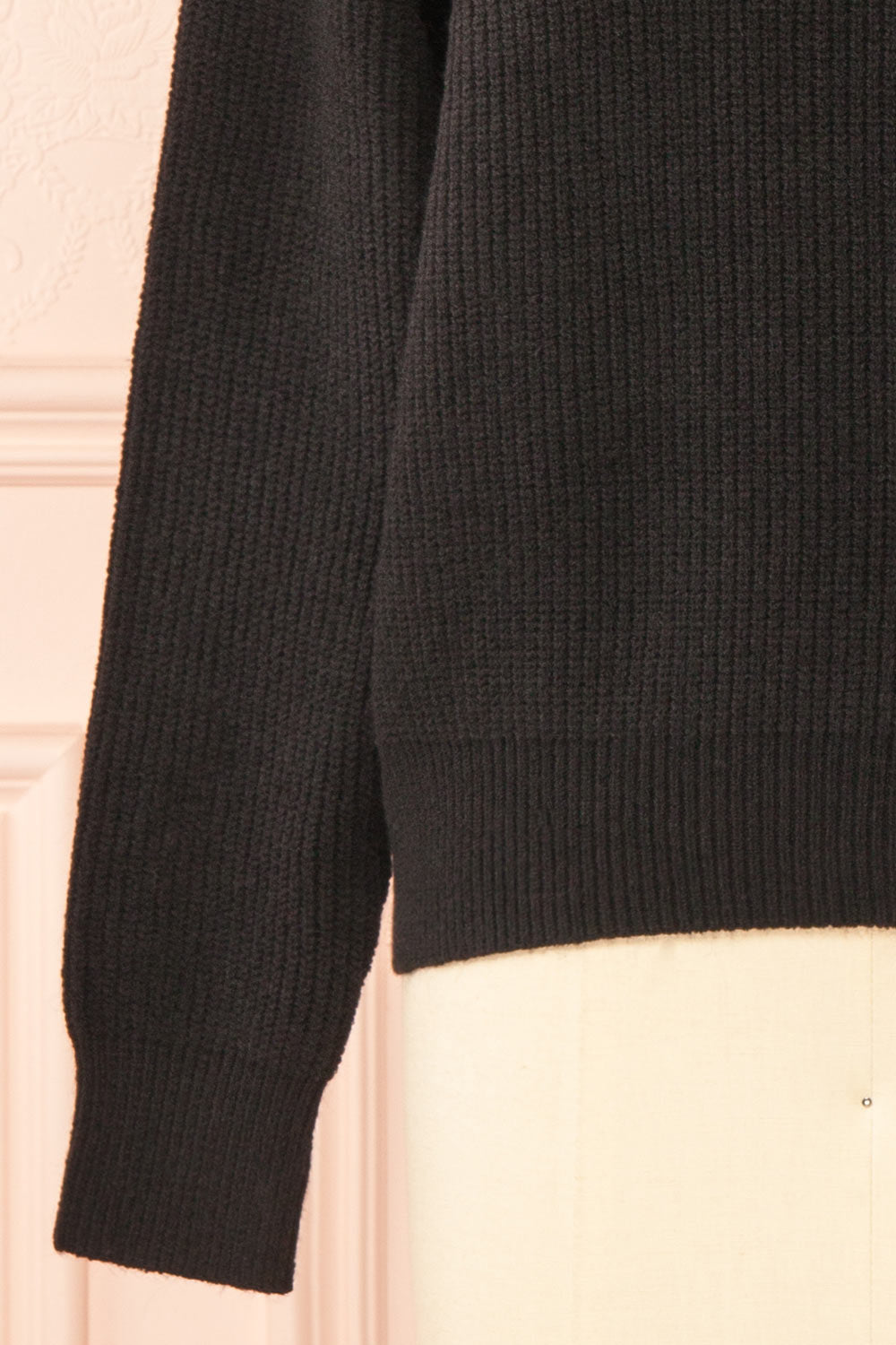 Dharapani Black Sweater with Pleated Flower | Boutique 1861 sleeve