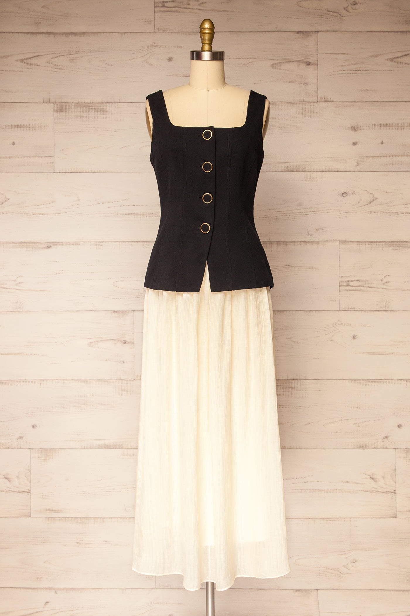 Front view Dhule Black Sleeveless Contrast Maxi Dress with Button Front at la petite garçonne