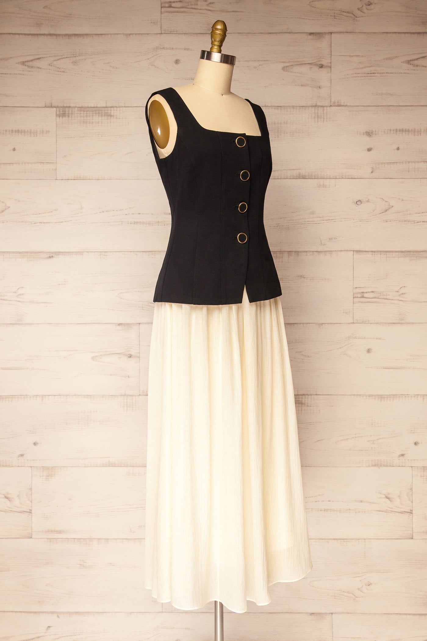 Profile view Dhule Black Sleeveless Contrast Maxi Dress with Button Front at la petite garçonne