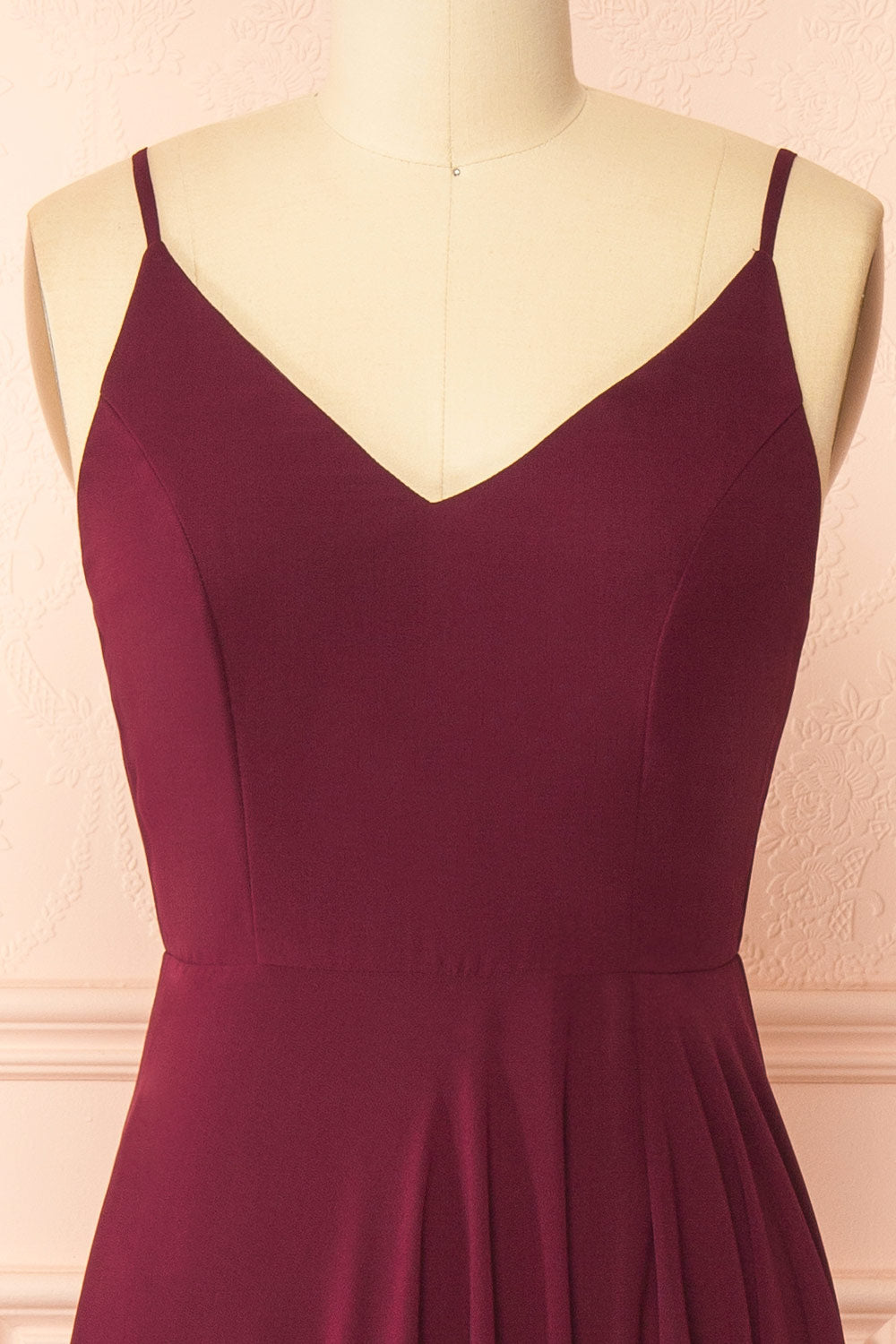 front of mannequin wearing Diana Burgundy Exclusive 1861 A-Line Chiffon Dress with Slit from Boutique 1861