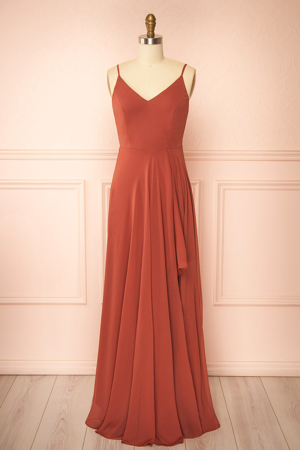 front view of a mannequin wearing Diana Rust Exclusive 1861 A-Line Chiffon Dress with Slit | Boutique 1861