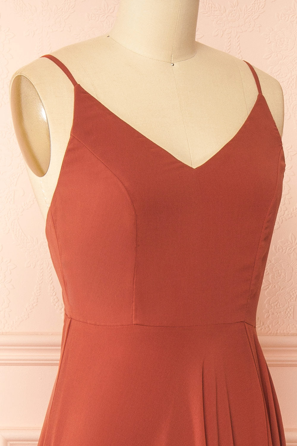 side of a mannequin wearing Diana Rust Exclusive 1861 A-Line Chiffon Dress with Slit | Boutique 1861