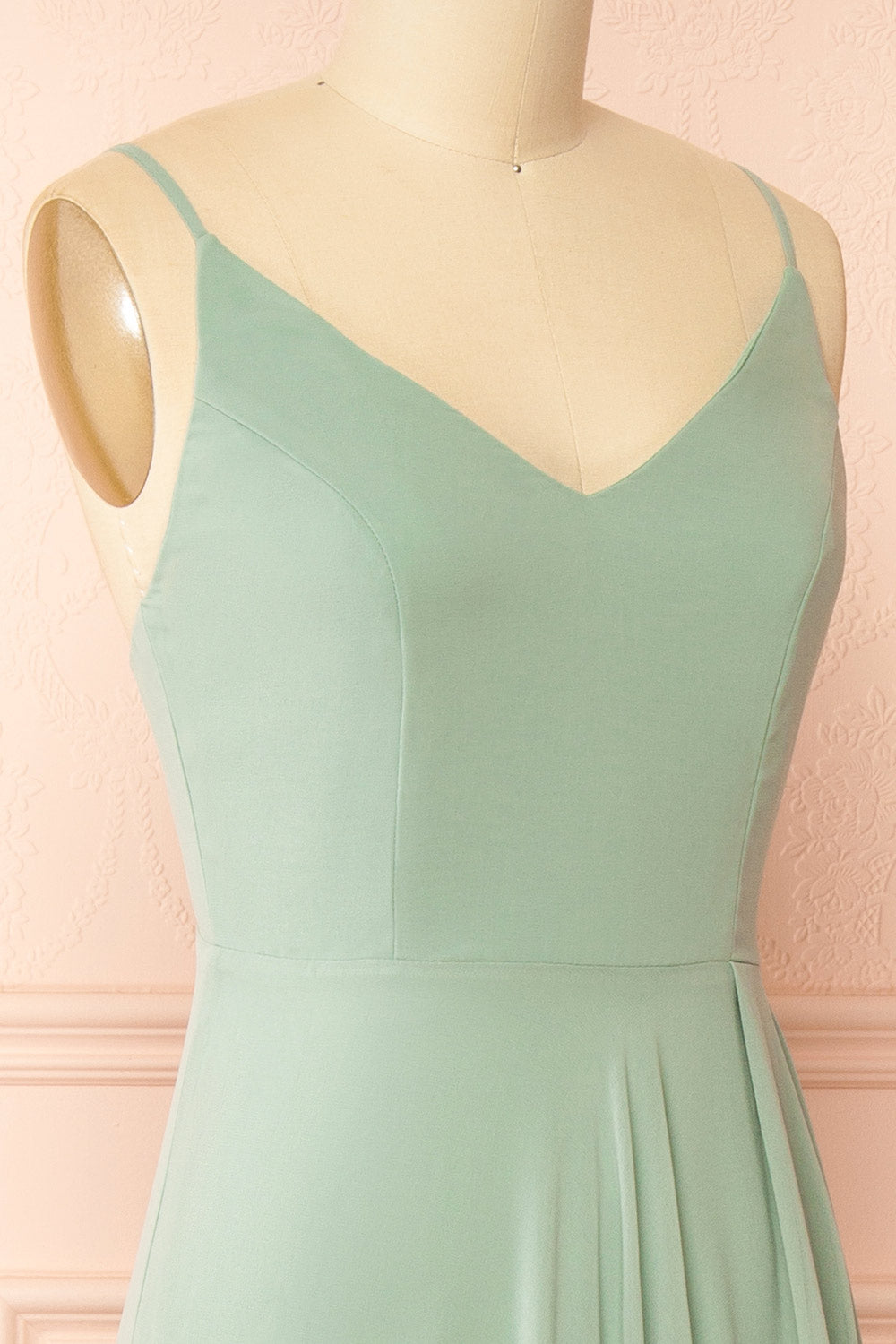 side of a mannequin wearing Diana Rust Exclusive 1861 A-Line Chiffon Dress with Slit | Boutique 1861