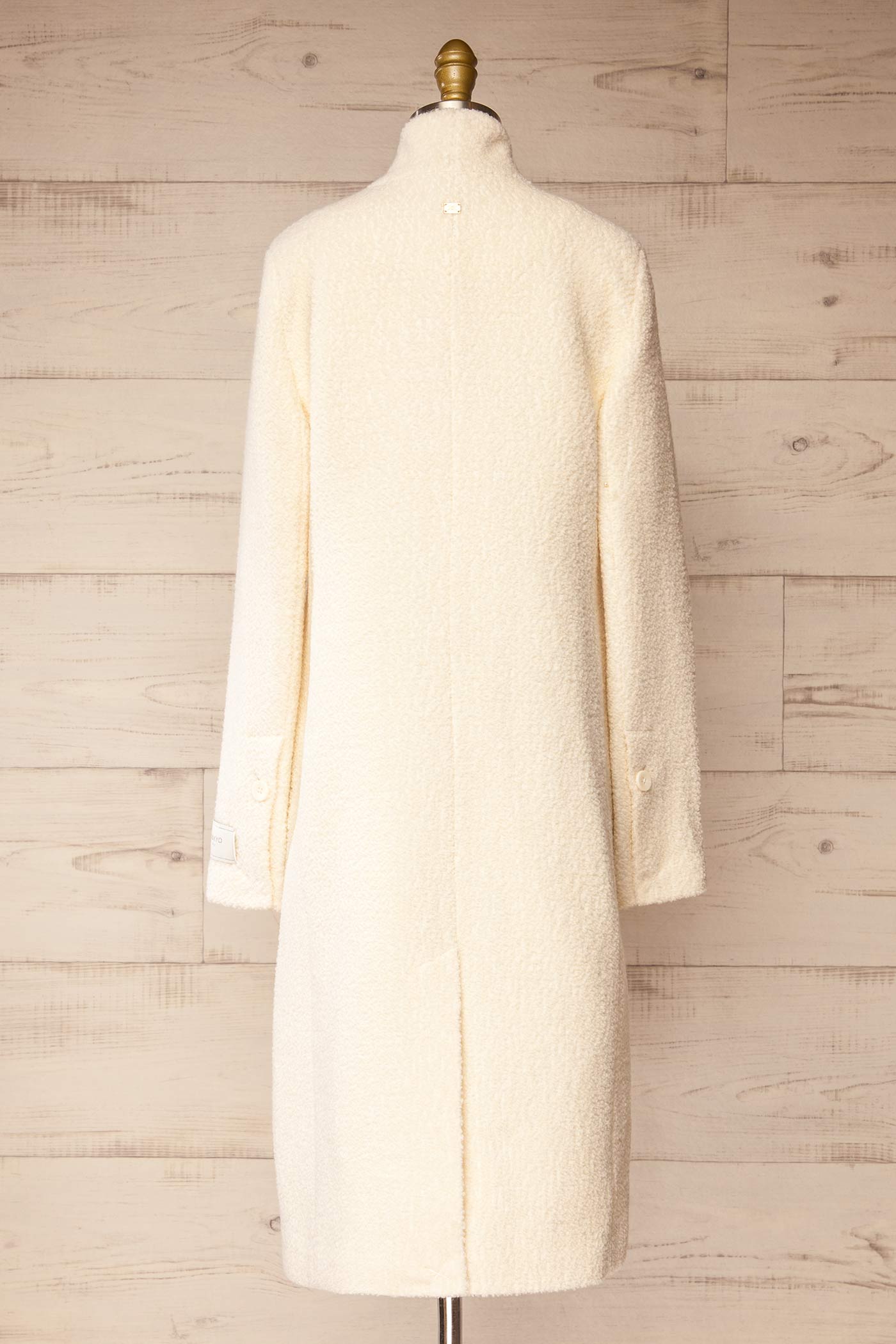 back view of Diane Ivory Curly Wool Coat with Pockets at La petite garçonne