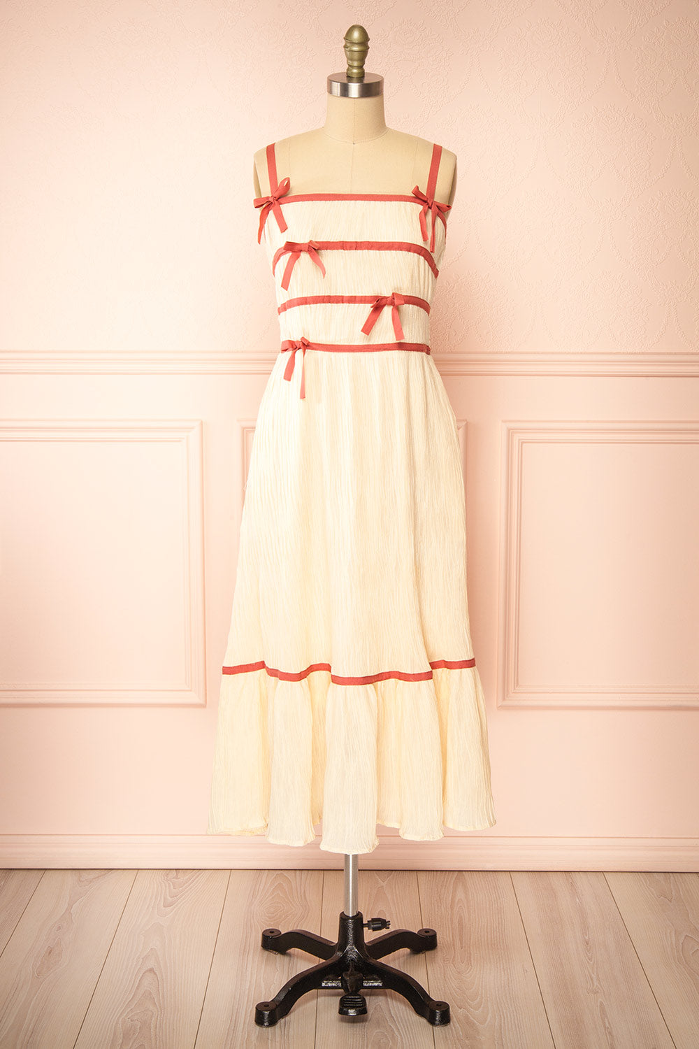 Dixie Beige Pleated Midi Dress w/ Pink Bows | Boutique 1861 front view