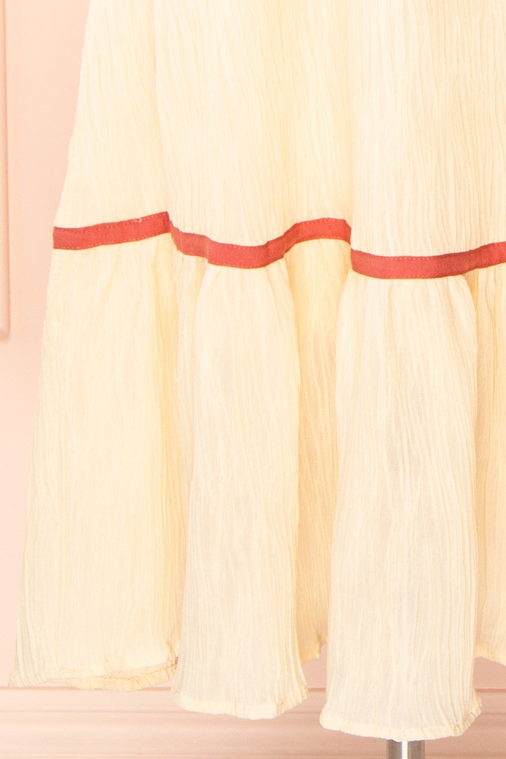 Dixie Beige Pleated Midi Dress w/ Pink Bows | Boutique 1861 bottom