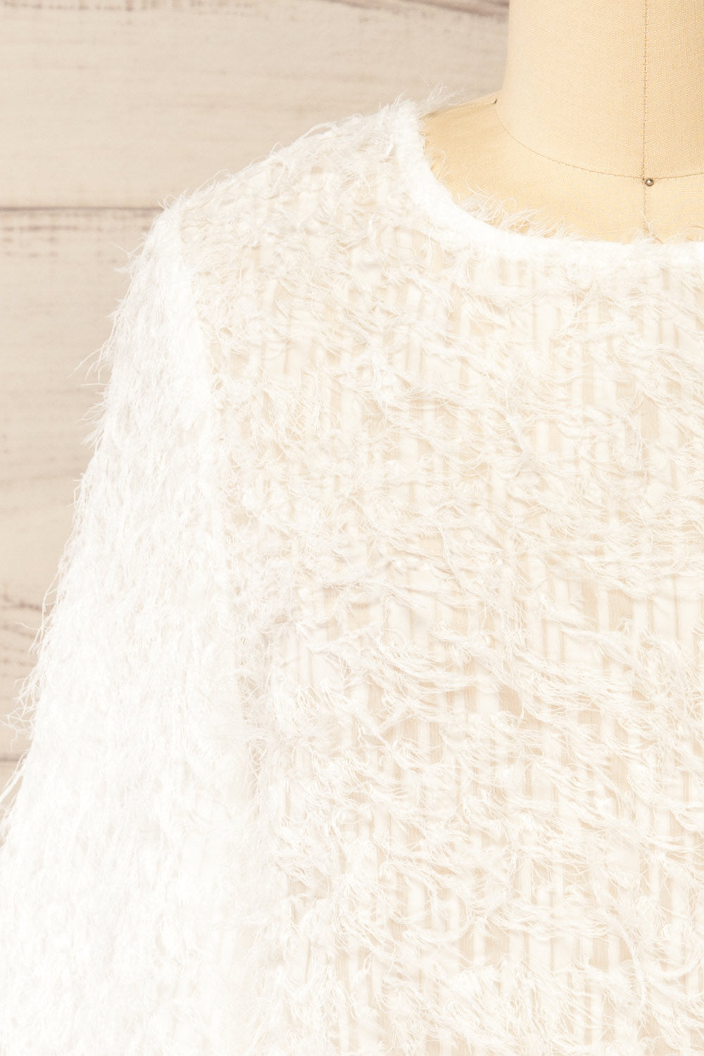 Dotriez Long-Sleeved White Fringed Top | La petite garçonne front